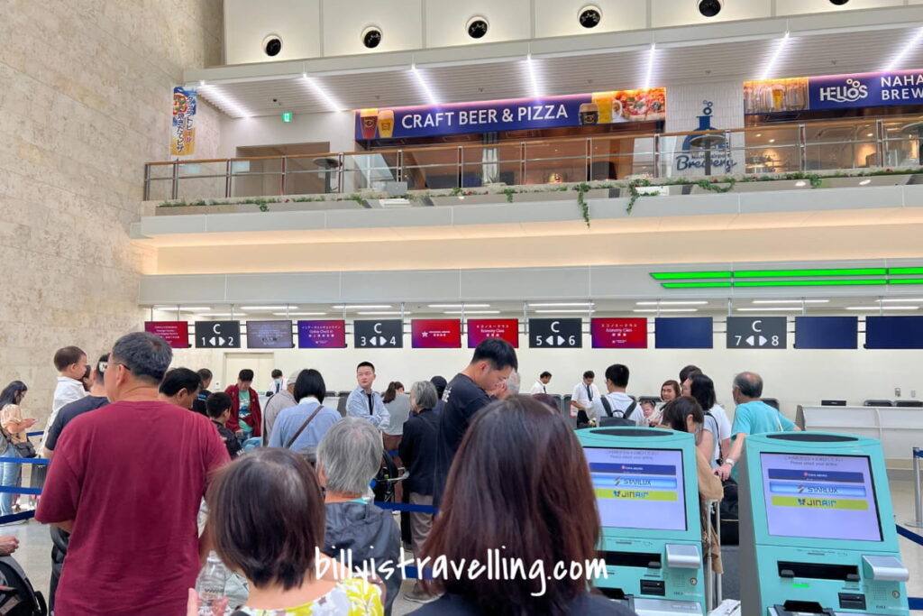 hkairlines hx679 oka airport check-in counter