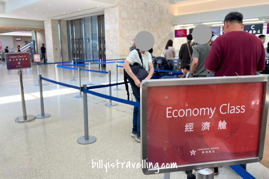 hkairlines hx679 oka airport check-in counter economy queue