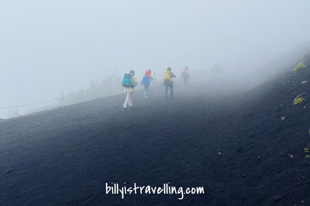 mt fuji hiking in fog weather