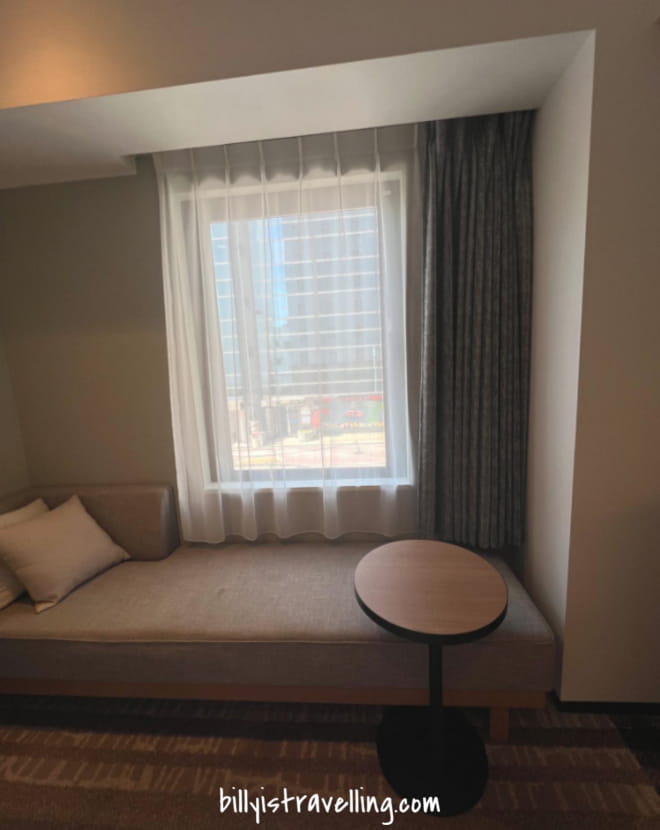 okinawa nest hotel naha nishi twin room sofa in the room