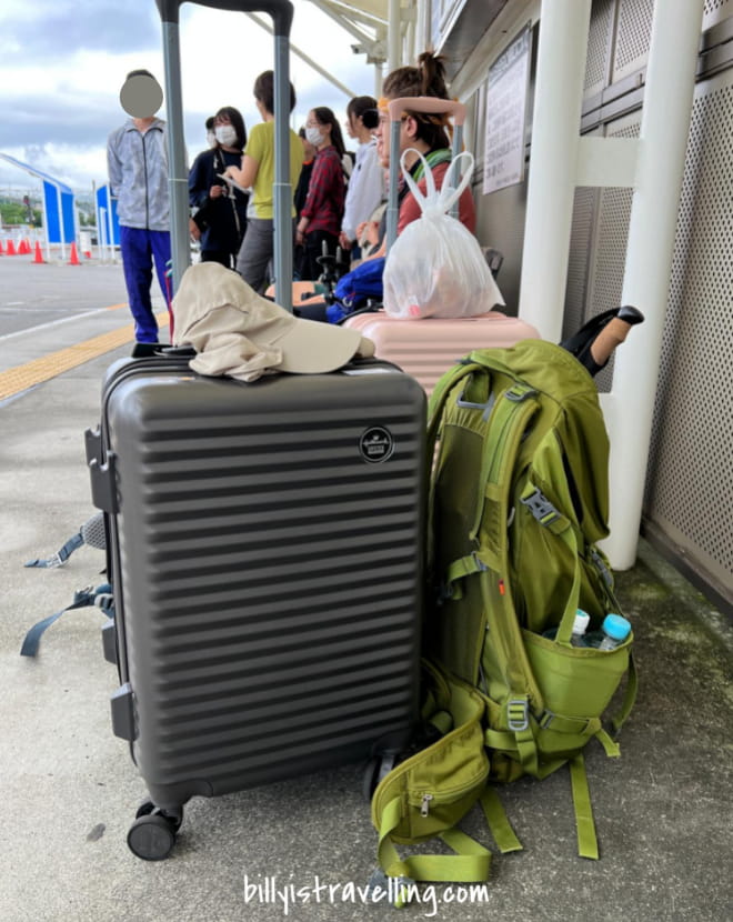waiting bus to 5th entrance with luggages